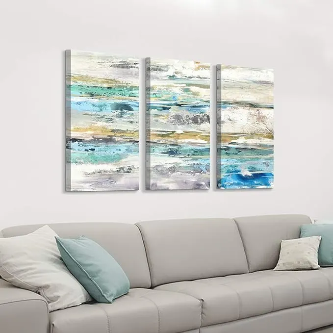 Three-panel ocean wave triptych in a modern living room